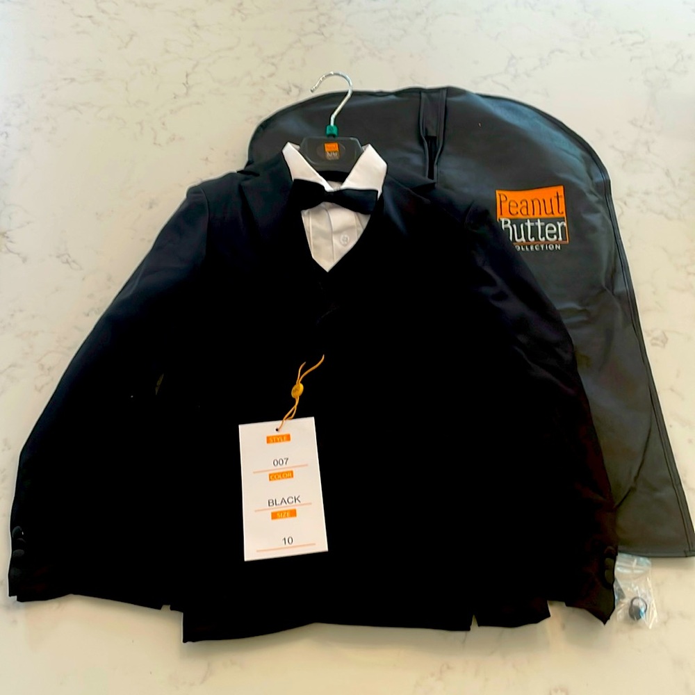 Brand new, never worn boys Peanut Butter tuxedo in black style 007.